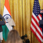U.S. President Donald Trump gestures during a joint press conference with Indian Prime Minister Narendra Modi at the White House in Washington, D.C., U.S., February 13, 2025. REUTERS/Kevin Lamarque