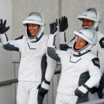 NASA's SpaceX Crew-10 crew members Pilot Nichole Ayers and Commander Anne McClain of U.S. and Cosmonaut Mission Specialist Kirill Peskov of Roscosmos of Russia, walk from the Operations & Checkout Building at the Kennedy Space Center for transport to Launch Complex 39-A ahead of their launch to the International Space Station in Cape Canaveral, Florida, U.S., March 14, 2025. REUTERS/Joe Skipper