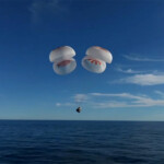The Crew Dragon capsule containing Butch Wilmore and Suni Williams and two other astronauts descends by parachute before their splashdown, following their return to earth from the International Space Station off the coast of Florida, U.S. March 18, 2025 in a still image from video. NASA TV/Handout via REUTERS.