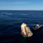 The Crew Dragon capsule containing Butch Wilmore and Suni Williams and two other astronauts floats after their splashdown following their return to earth from the International Space Station off the coast of Florida, U.S. March 18, 2025 in a still image from video. NASA TV/Handout via REUTERS.