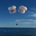The Crew Dragon capsule containing Butch Wilmore and Suni Williams and two other astronauts descends by parachute before their splashdown, following their return to earth from the International Space Station off the coast of Florida, U.S. March 18, 2025 in a still image from video. NASA TV/Handout via REUTERS