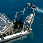 The Crew Dragon capsule containing Butch Wilmore and Suni Williams and two other astronauts is hoisted onto a recovery ship after their splashdown, following their return to earth from the International Space Station off the coast of Florida, U.S. March 18, 2025 in a still image from video. NASA TV/Handout via REUTERS.