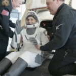 Suni Williams reacts as she is helped to leave a Crew Dragon space capsule after she and Butch Wilmore, and two other astronauts, splashed down following their return to earth from the International Space Station off the coast of Florida, U.S. March 18, 2025 in a still image from video. NASA TV/Handout via REUTERS.