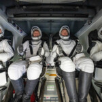 NASA astronaut Butch Wilmore, Nick Hague, and Suni Williams and Roscosmos cosmonaut Aleksandr Gorbunov are seen inside a SpaceX Dragon spacecraft onboard the SpaceX recovery ship MEGAN shortly after having landed in the water off the coast of Tallahassee, Florida, Tuesday, March 18, 2025. NASA/Keegan Barber/ Handout via REUTERS