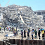 Rescuers work at the site of a collapsed building after the tremors of a strong earthquake that struck central Myanmar on Friday affected Bangkok, Thailand, March 28, 2025. REUTERS/Ann Wang