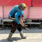A worker carries a casualty on his back after a strong earthquake struck central Myanmar on Friday, earthquake monitoring services said, which affected Bangkok as well with people pouring out of buildings following the tremors in the Thai capital, in Bangkok, Thailand, March 28, 2025. REUTERS/Ann Wang