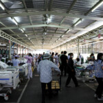 Patients are evacuated from Rajavithi Hospital after a strong earthquake struck central Myanmar on Friday, earthquake monitoring services said, which affected Bangkok as well with hundreds of people pouring out of buildings in the Thai capital in panic after the tremors, in Bangkok, Thailand, March 28, 2025. REUTERS/Chalinee Thirasupa