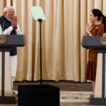 India's Prime Minister Narendra Modi and Thailand's Prime Minister Paetongtarn Shinawatra gesture during a press conference at the Government House, in Bangkok, Thailand, April 3, 2025. REUTERS/Athit Perawongmetha