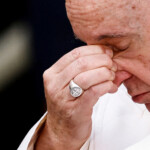 FILE PHOTO: Pope Francis cries while speaking about Ukraine as he attends the Immaculate Conception celebration prayer in Piazza di Spagna in Rome, Italy, December 8, 2022. REUTERS/Yara Nardi/File Photo