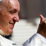 FILE PHOTO: Pope Francis gives a thumbs up as he arrives for the weekly general audience at the Vatican, May 18, 2022. REUTERS/Guglielmo Mangiapane/File Photo
