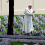 FILE PHOTO: Pope Francis blesses the Austro-Hungarian cemetery at Fogliano in Redipuglia September 13, 2014. REUTERS/Stefano Rellandini/File Photo