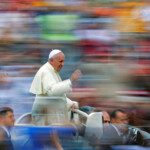 FILE PHOTO: Pope Francis waves as he leads a special audience for members of CSI (Italian sport centres) in Saint Peter's Square at the Vatican June 7, 2014. REUTERS/Max Rossi/File Photo