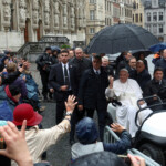 FILE PHOTO: Pope Francis greets people gathered in the streets of Leuven, Belgium September 27, 2024. REUTERS/Yves Herman/File Photo