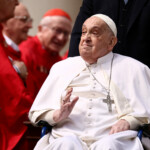 FILE PHOTO: Pope Francis greets cardinals as he unexpectedly appears during the Palm Sunday Mass in Saint Peter's Square at the Vatican, April 13, 2025. REUTERS/Yara Nardi/File Photo