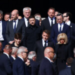 Ukraine's President Volodymyr Zelenskiy, French President Emmanuel Macron and his wife Brigitte Macron arrive ahead of the funeral Mass of Pope Francis in St. Peter's Square at the Vatican, April 26, 2025. REUTERS/Guglielmo Mangiapane