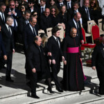 Argentina's President Javier Milei walks ahead of the funeral Mass of Pope Francis, in Saint Peter's Square, at the Vatican, April 26, 2025. REUTERS/Dylan Martinez