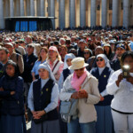 Faithful gather as they attend the funeral Mass of Pope Francis in St. Peter's Square, at the Vatican, April 26, 2025. REUTERS/Kevin Coombs