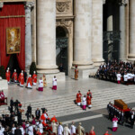 The coffin of Pope Francis is carried during the funeral Mass of Pope Francis in St. Peter's Square at the Vatican, April 26, 2025. REUTERS/Kai Pfaffenbach