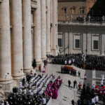 The coffin of Pope Francis is carried during the funeral Mass of Pope Francis in St. Peter's Square at the Vatican, April 26, 2025. REUTERS/Nathan Howard