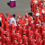 Clergy members attend the funeral Mass of Pope Francis in St. Peter's Square at the Vatican, April 26, 2025. REUTERS/Remo Casilli