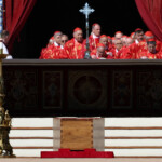 The coffin of Pope Francis is seen during his funeral Mass in St. Peter's Square at the Vatican, April 26, 2025. REUTERS/Guglielmo Mangiapane