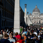 People gather on the day of the funeral for Pope Francis, in Rome, Italy, April 26, 2025. REUTERS/Benoit Tessier