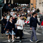 People gather on the day of the funeral for Pope Francis, in Rome, Italy, April 26, 2025. REUTERS/Benoit Tessier