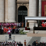 The coffin of Pope Francis is carried during the funeral Mass of Pope Francis in St. Peter's Square, as seen from Rome, Italy, April 26, 2025. REUTERS/Hannah McKay