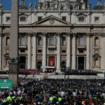 People attend the funeral Mass of Pope Francis, in St. Peter's Square, as seen from Rome, Italy, April 26, 2025. REUTERS/Hannah McKay