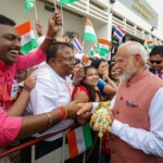 Members of Indian community in Thailand extend a warm welcome to PM Modi upon his arrival