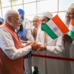 Members of Indian community in Thailand extend a warm welcome to PM Modi upon his arrival