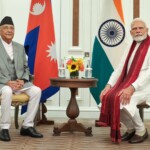 PM Narendra Modi met with Nepal PM  KP Sharma Oli in Bangkok.
