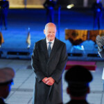 Outgoing German Chancellor Olaf Scholz, acting German Defence Minister Boris Pistorius and Inspector General of the Bundeswehr Carsten Breuer attend a military Grand Tattoo ("Grosser Zapfenstreich") of the German armed forces Bundeswehr at the Defence Ministry in Berlin, Germany May 5, 2025. Michael Kappeler/Pool via REUTERS
