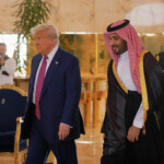 U.S. President Donald Trump and Saudi Crown Prince Mohammed Bin Salman walk as he arrives in Riyadh, Saudi Arabia, May 13, 2025. REUTERS/Brian Snyder