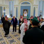 U.S. President Donald Trump is greeted at The Royal Court as he visits Riyadh, Saudi Arabia, May 13, 2025. REUTERS/Brian Snyder