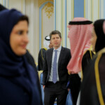 OpenAI CEO Sam Altman looks on as he visits Riyadh with U.S. President Donald Trump and Tesla CEO Elon Musk (both not pictured), in Riyadh, Saudi Arabia, May 13, 2025. REUTERS/Brian Snyder
