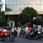 People gather in the street in the aftermath of Israeli strikes, in Tehran, Iran, June 13, 2025. Majid Asgaripour/WANA (West Asia News Agency) via REUTERS