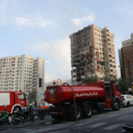 Fire trucks are parked near a damaged building in the aftermath of Israeli strikes, in Tehran, Iran, June 13, 2025. Majid Asgaripour/WANA (West Asia News Agency) via REUTERS