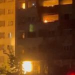 Fire burns in a building damaged in an Israeli strike in Tehran, Iran in this screengrab obtained from a social media video released on July 13, 2025. Social Media/via REUTERS