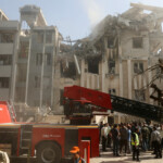 Rescuers work at the scene of a damaged building in the aftermath of Israeli strikes, in Tehran, Iran, June 13, 2025. Majid Asgaripour/WANA (West Asia News Agency) via REUTERS