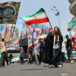 People attend an anti-Israeli protest following the Israeli strikes on Iran, in Tehran, Iran, June 13, 2025. Majid Asgaripour/WANA (West Asia News Agency) via REUTERS