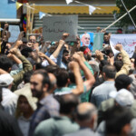 People attend an anti-Israeli protest following the Israeli strikes on Iran, in Tehran, Iran, June 13, 2025. Majid Asgaripour/WANA (West Asia News Agency) via REUTERS