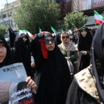 People attend an anti-Israeli protest following the Israeli strikes on Iran, in Tehran, Iran, June 13, 2025. Majid Asgaripour/WANA (West Asia News Agency) via REUTERS