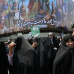 People attend an anti-Israeli protest following the Israeli strikes on Iran, in Tehran, Iran, June 13, 2025. Majid Asgaripour/WANA (West Asia News Agency) via REUTERS