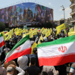People attend an anti-Israeli protest following the Israeli strikes on Iran, in Tehran, Iran, June 13, 2025. Majid Asgaripour/WANA (West Asia News Agency) via REUTERS