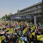 People attend an anti-Israeli protest following the Israeli strikes on Iran, in Tehran, Iran, June 13, 2025. Majid Asgaripour/WANA (West Asia News Agency) via REUTERS