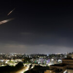Missiles launched from Iran are intercepted, as seen from the city of Ashkelon, Israel, June 13, 2025. REUTERS/Amir Cohen