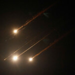 Missiles launched from Iran are intercepted, as seen from the city of Ashkelon, Israel, June 13, 2025. REUTERS/Amir Cohen