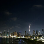Missiles launched from Iran are intercepted as seen from Tel Aviv, Israel June 13, 2025. REUTERS/Jamal Awad