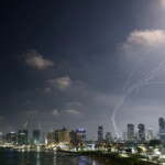 Missiles launched from Iran are intercepted as seen from Tel Aviv, Israel June 13, 2025. REUTERS/Jamal Awad